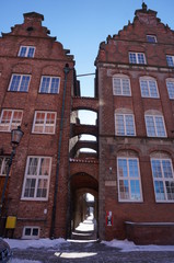 Fototapeta premium Light narrow street Elblag downtown
