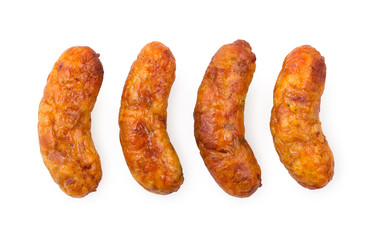 Four homemade grilled sausages isolated on a white background, top view.