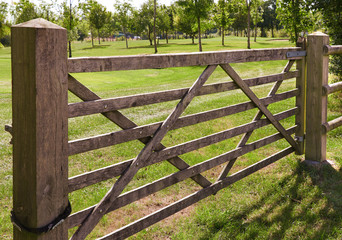Wooden six bar gate in country park
