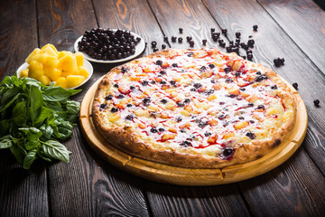 Fruit sweet pizza. Pizza for dessert. .Pizza with sweet berries