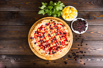 Fruit sweet pizza. Pizza for dessert. .Pizza with sweet berries