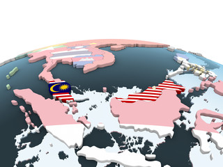 Malaysia with flag on globe