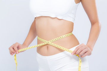 Asian woman diet and slim with measuring waist for weight isolated on white background, girl have...