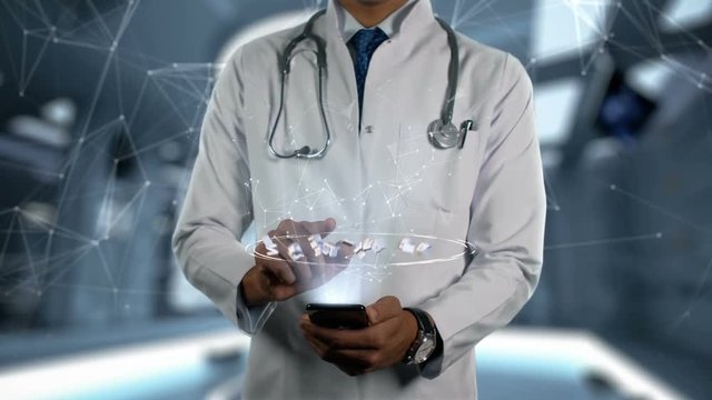 Underactive thyroid - Male Doctor With Mobile Phone Opens and Touches Hologram Illness Word