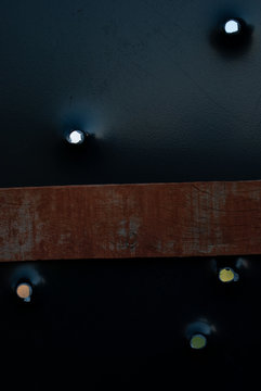  bullet holes, plate, wood.