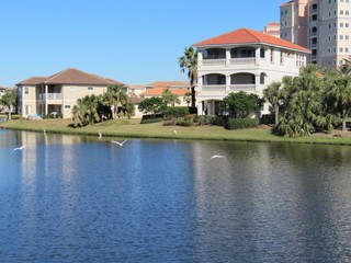 Community lake in a residential are surrounded by homes