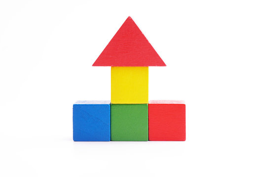 multi colored wooden block on white background