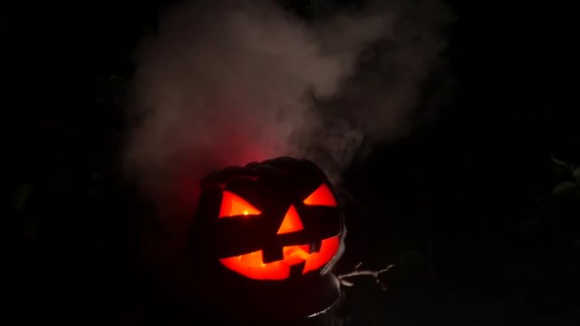 Red eye pumpking in Halloween Horror Scene
