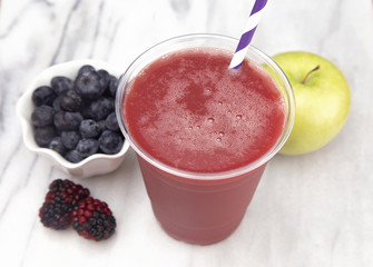 Berry Smoothie in a Plastic Disposable Cup