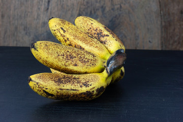 Sweet golden banana fruit isolate on Green grass
