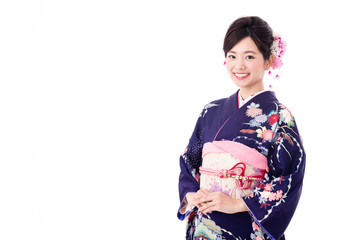 Fototapeta premium portrait of young asian woman wearing purple kimono on white background