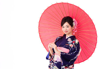 Fototapeta premium portrait of young asian woman wearing purple kimono on white background