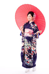 portrait of young asian woman wearing purple kimono on white background