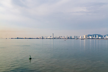 Sunrise cityscape view of Penang Island from Straits of Malacca