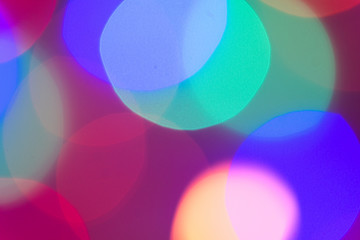 Colorful abstract bokeh light texture pattern background at night.