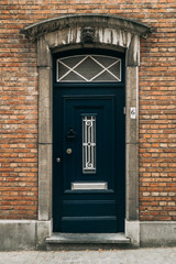 Classical European blue door in Brugge, Belgium