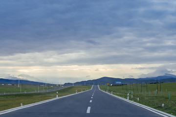 Road leading to mountain in Qinghai, China