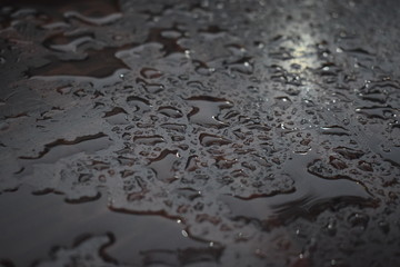 Beautiful background from a wet wooden surface. Desctop computer. Copy space.