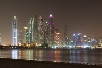 Fototapeta na wymiar Beautiful night view of Dubai Marina and the Skyscrapers, Dubai, United Arab Emirates