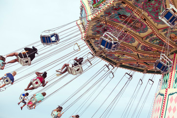 Fair Swing ride with kids © illuminating images