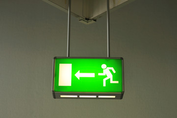 lamp showing direction of emergency exit