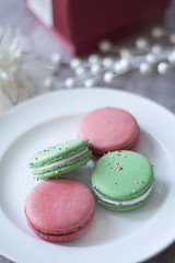 christmas macaroons red and green set out for santa