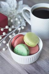 green and red christmas cookies with coffee