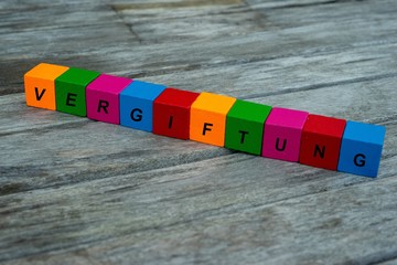 Farbige Holzwürfel mit Buchstaben auf dem das Wort Vergiftung abgebildet ist, Abstrakte...
