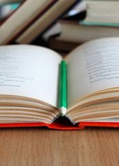open book with pencil