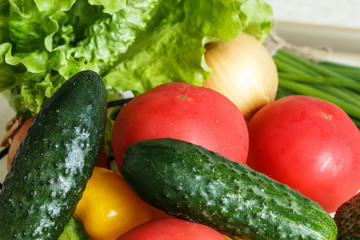 Fresh vegetables on the kitchen table. Close-up.