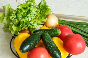 Harvest of fresh vegetables on the kitchen table. Selective focus. Top view.