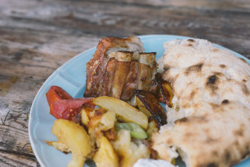 baked pork with potato and homemade bread