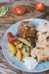 baked pork with potato and homemade bread