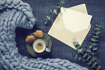 Blanket, letter and a cup of coffee