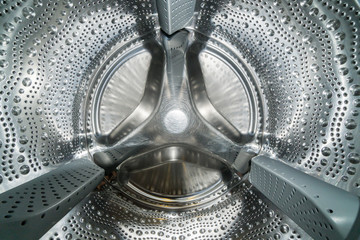 Internal view of a washing machine drum. Closeup