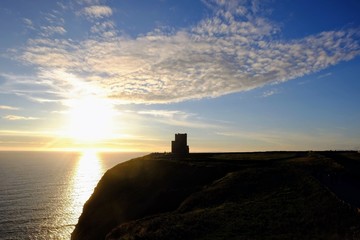 Tower and cliffs of Moher