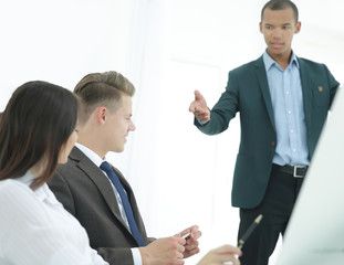 colleagues discussing new ideas in the office