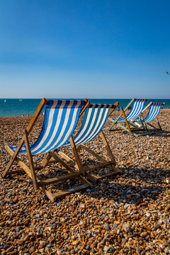 Deckchairs on a pebble beach