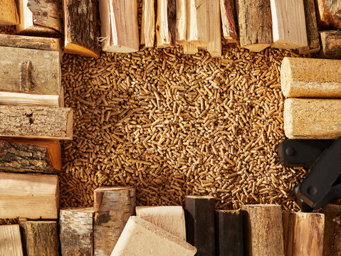 Border of wood logs forming square frame in center
