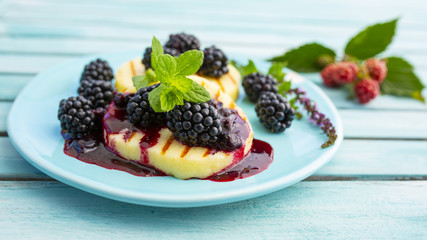 Delicious grilled cheese with fresh blackberries. 