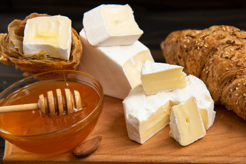 slices of cheese brie or camembert with croissants