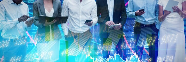 Composite image of business people using wireless technology
