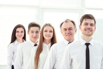close up. a successful group of employees standing in a row