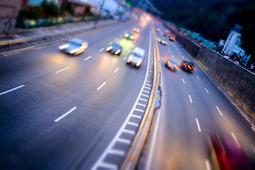 Night car city raffic. Motion blur car on the highway in big modern city. - 221951380