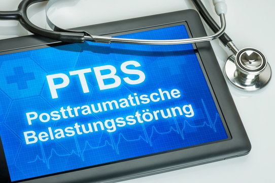 Tablet mit dem Text PTBS auf dem Display