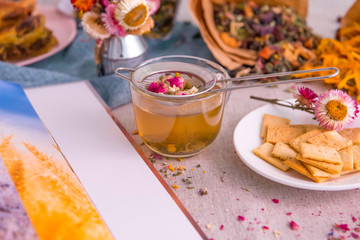 Autumn herbal tea on the table