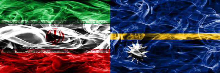 Iran vs Nauru smoke flags placed side by side. Thick colored silky smoke flags of iranian and Nauru.