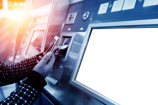 finance, money, bank and people concept - close up of hand entering pin code at atm machine