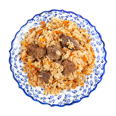 top view of cooked pilaf on local ceramic plate