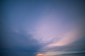 Winter Sunset and Blue and Pink Sky with Light Clouds Cover